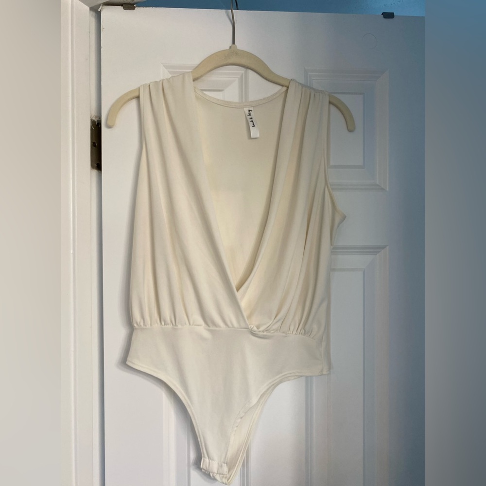 White/cream body suit